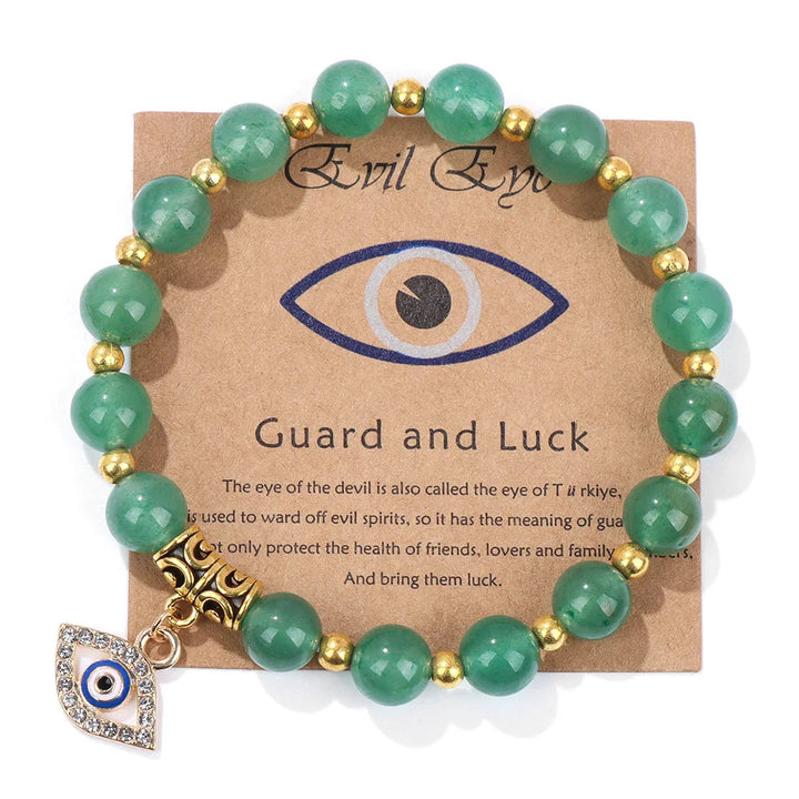 Stylish Women's Turkish Evil Eye bracelet with black lava stone protection beads. Spiritual talisman jewelry gift.