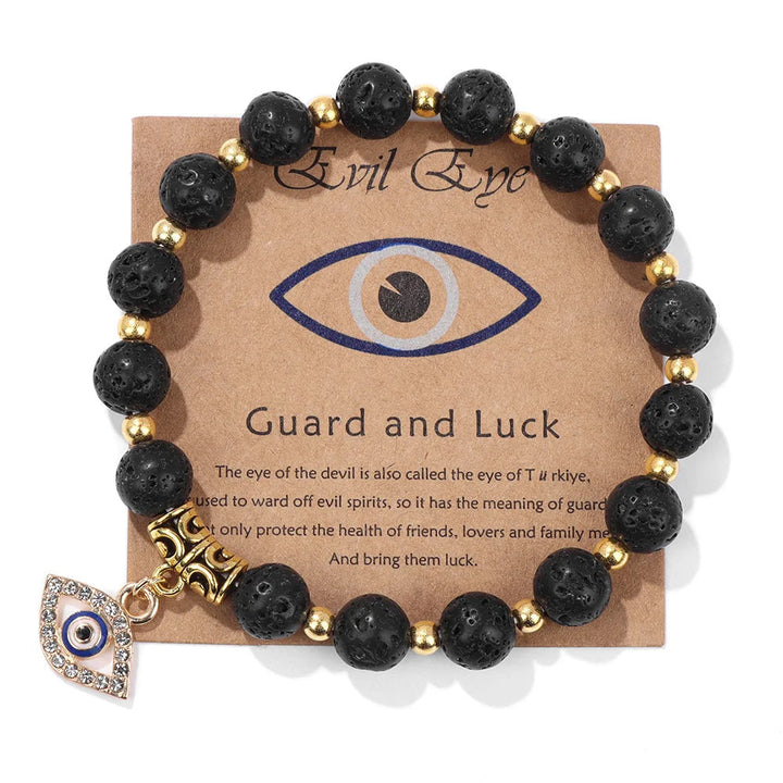 Women's Turkish Evil Eye bracelet on a wrist, showcasing blue sodalite protection beads. Spiritual fashion jewelry.