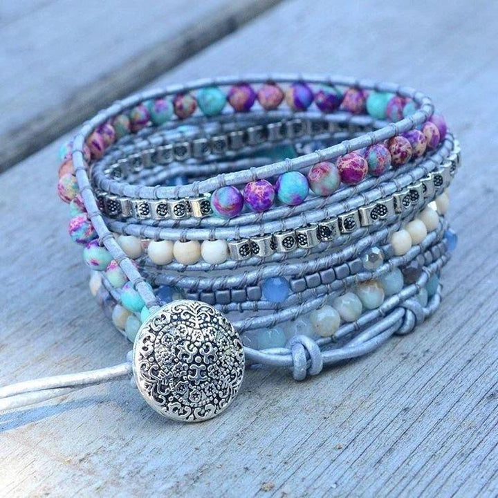 Close-up of a women's turquoise healing stone wrap bracelet, Selina design
