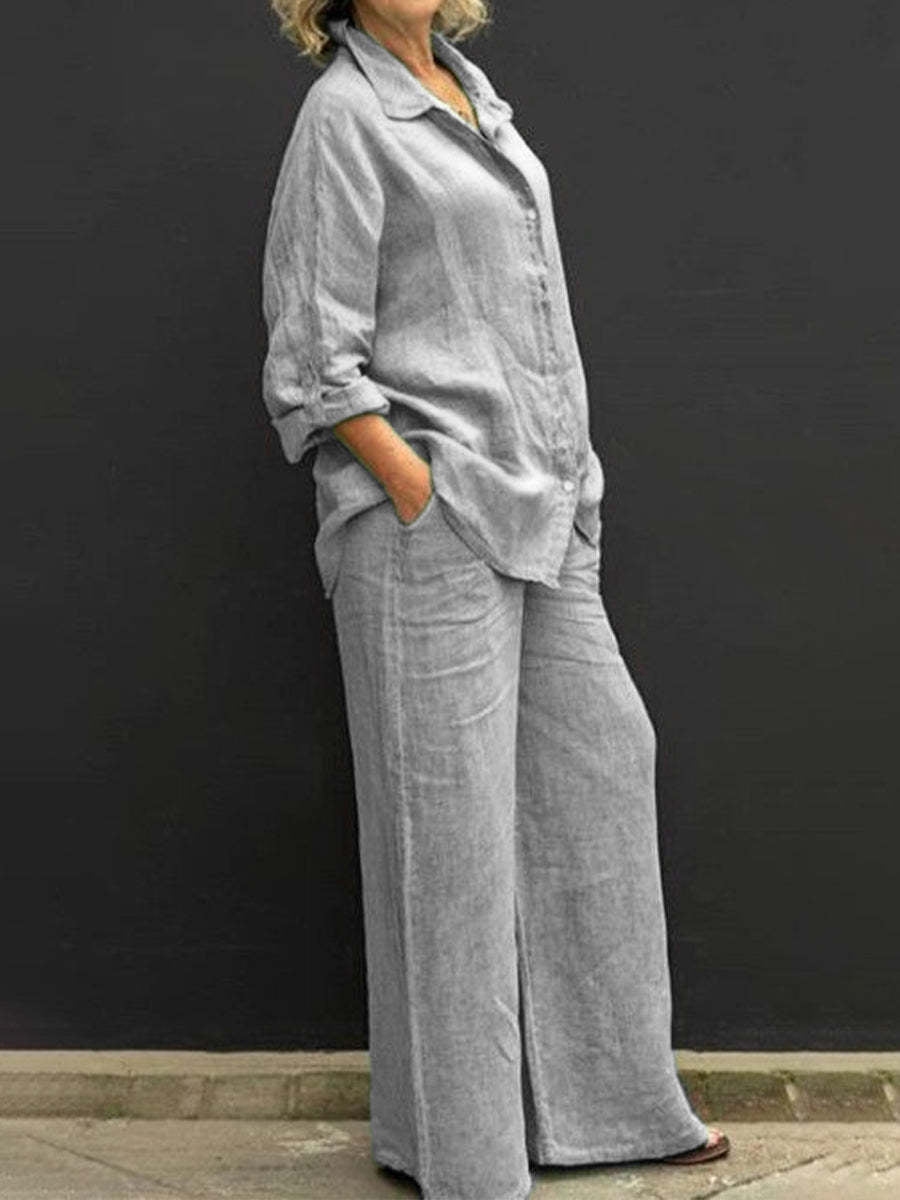 Elegant women's cotton-linen two-piece outfit, a stylish blouse & trousers ensemble for a sophisticated summer look.