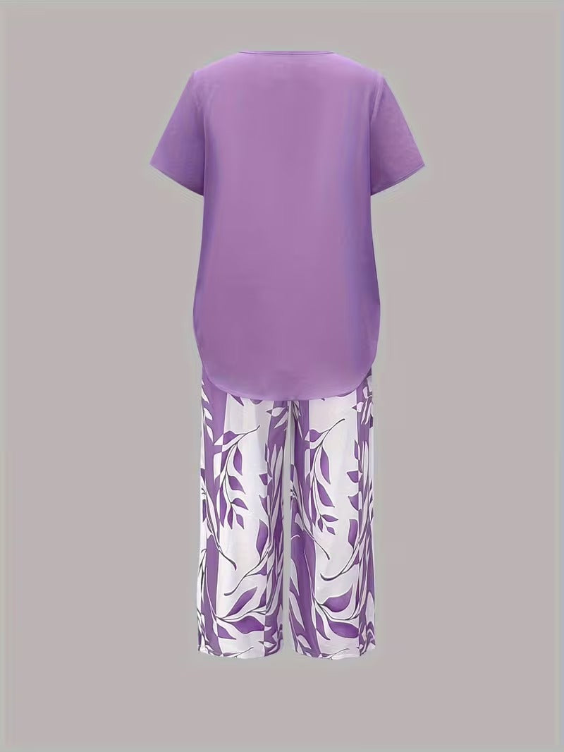 Chic women's botanical print casual outfit. Top and cropped pants set for summer & travel.
