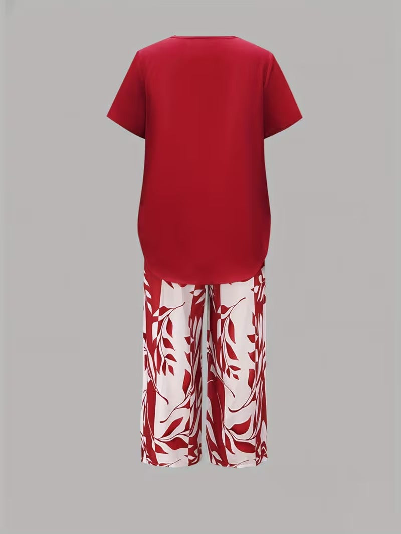 Women's vibrant leaf print summer outfit. Includes a flattering top & breathable cropped pants.