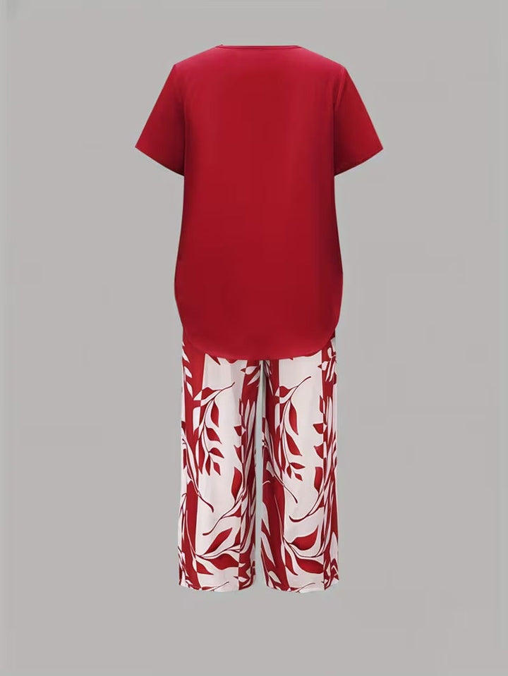 Women's vibrant leaf print summer outfit. Includes a flattering top & breathable cropped pants.