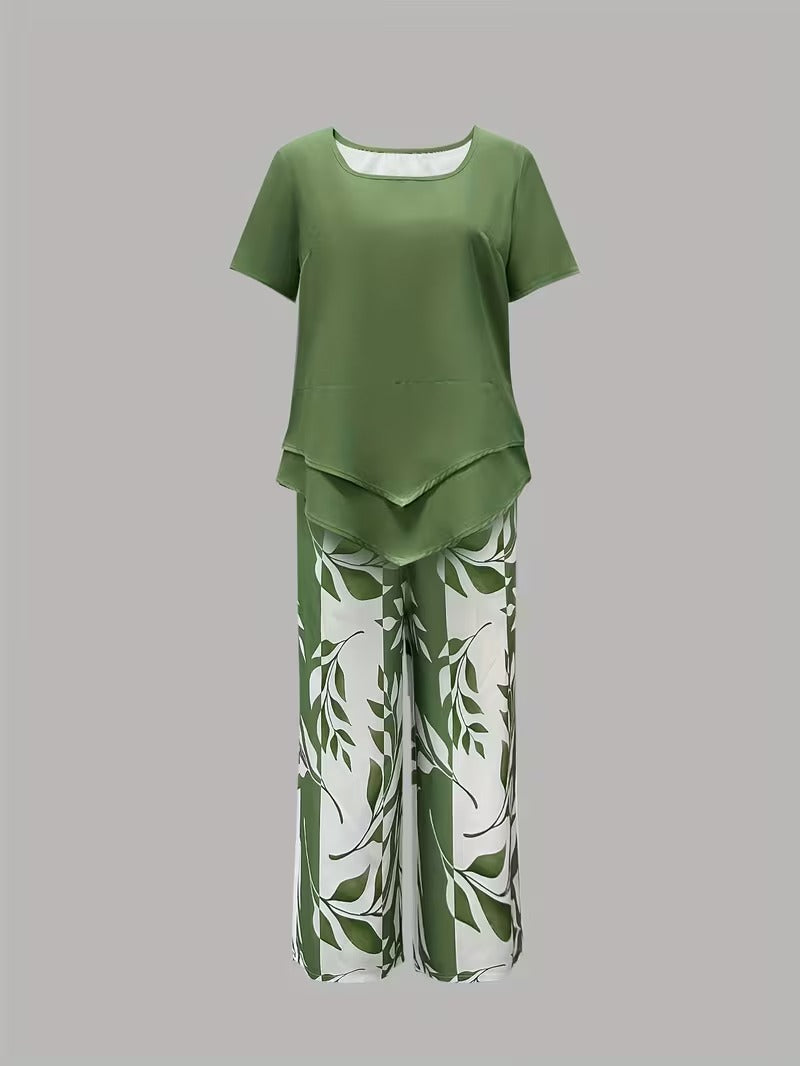 Botanical print women's outfit: loose-fit top and cropped trousers. Comfortable summer two-piece set.