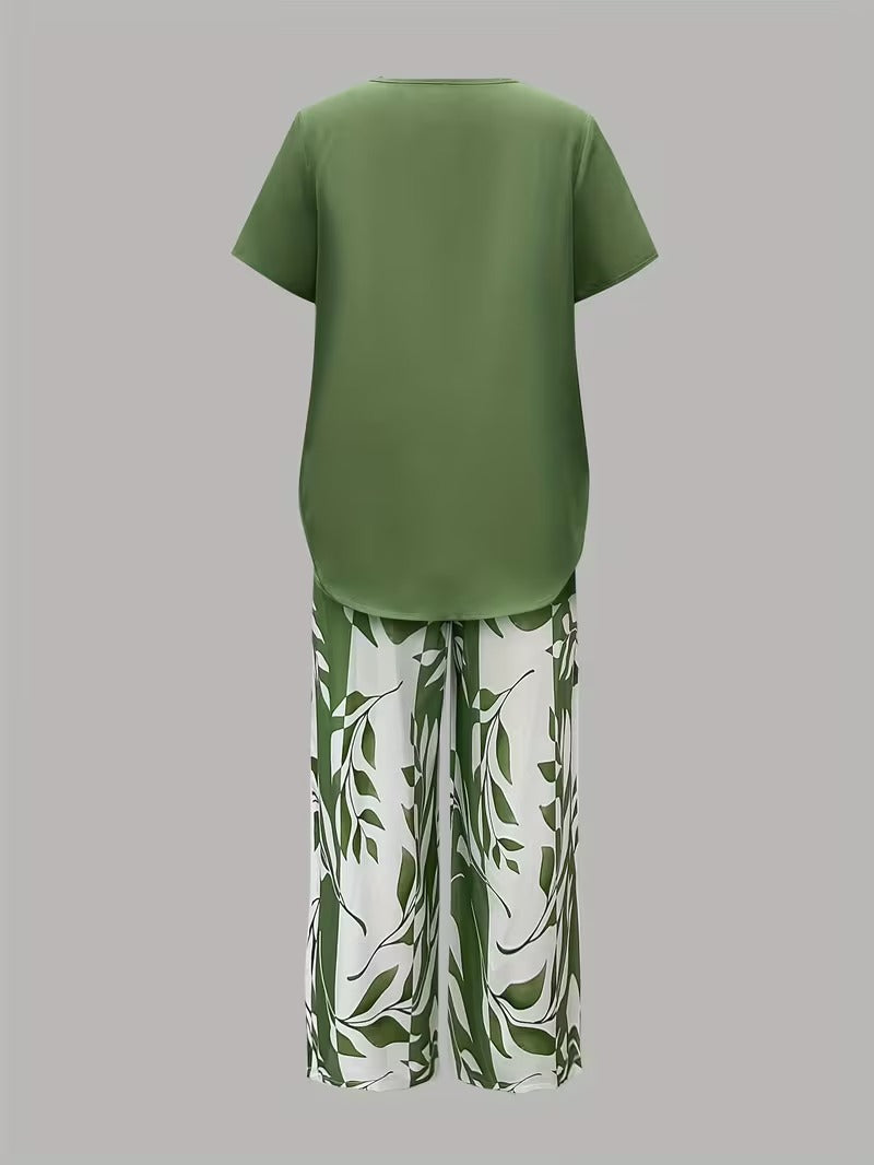 Summer-ready women's leaf print 2-piece set. Includes a stylish top & comfortable cropped pants.