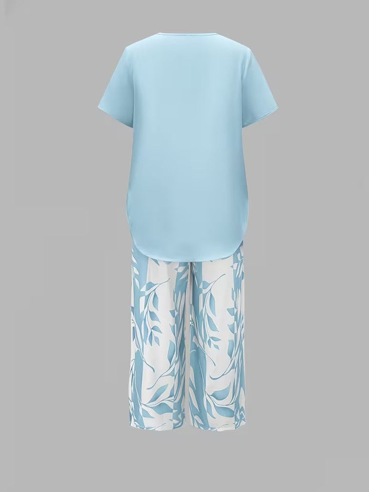 Women's coordinated leaf print top & cropped pant set. Perfect for effortless summer casual style.