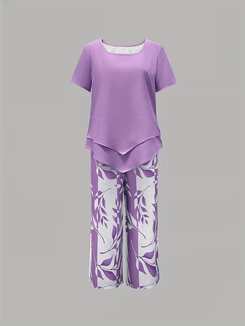 Flowy women's two-piece leaf print outfit, featuring a relaxed top and comfortable cropped pants.