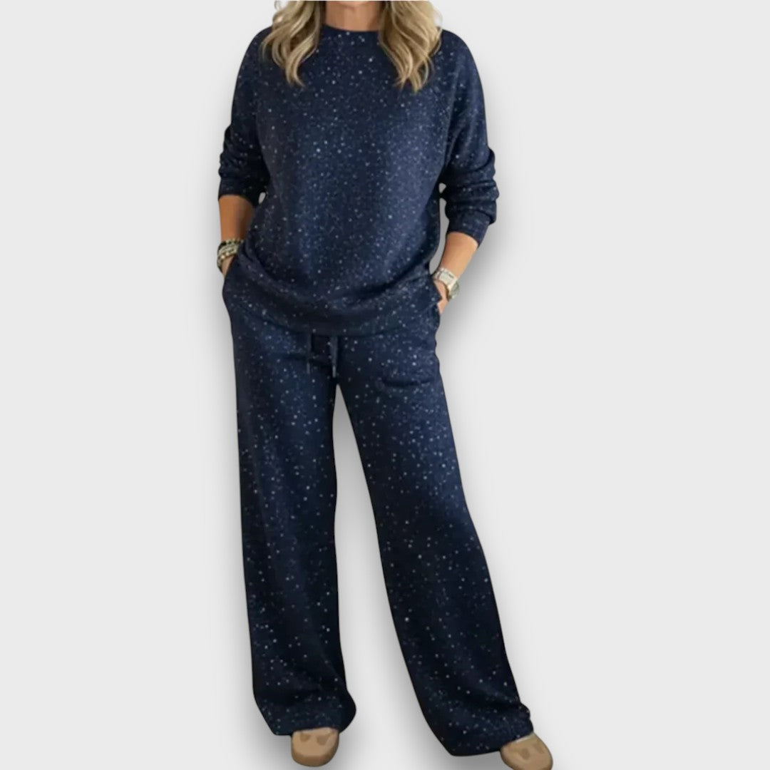 Comfortable women's two-piece lounge set featuring soft fabric & a relaxed fit, ideal for home & casual wear.