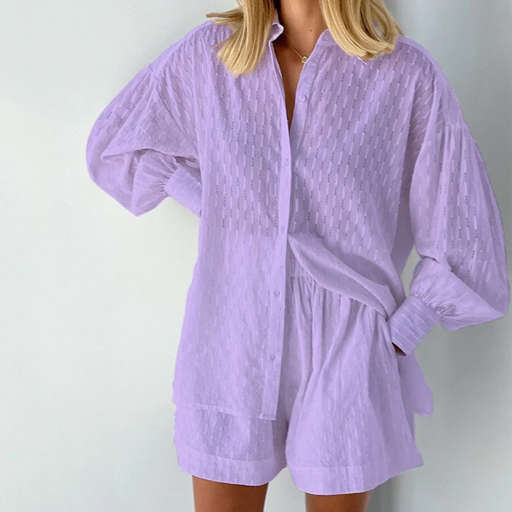 Stylish women's two-piece shorts set for summer, featuring trendy lantern sleeves & relaxed fit.