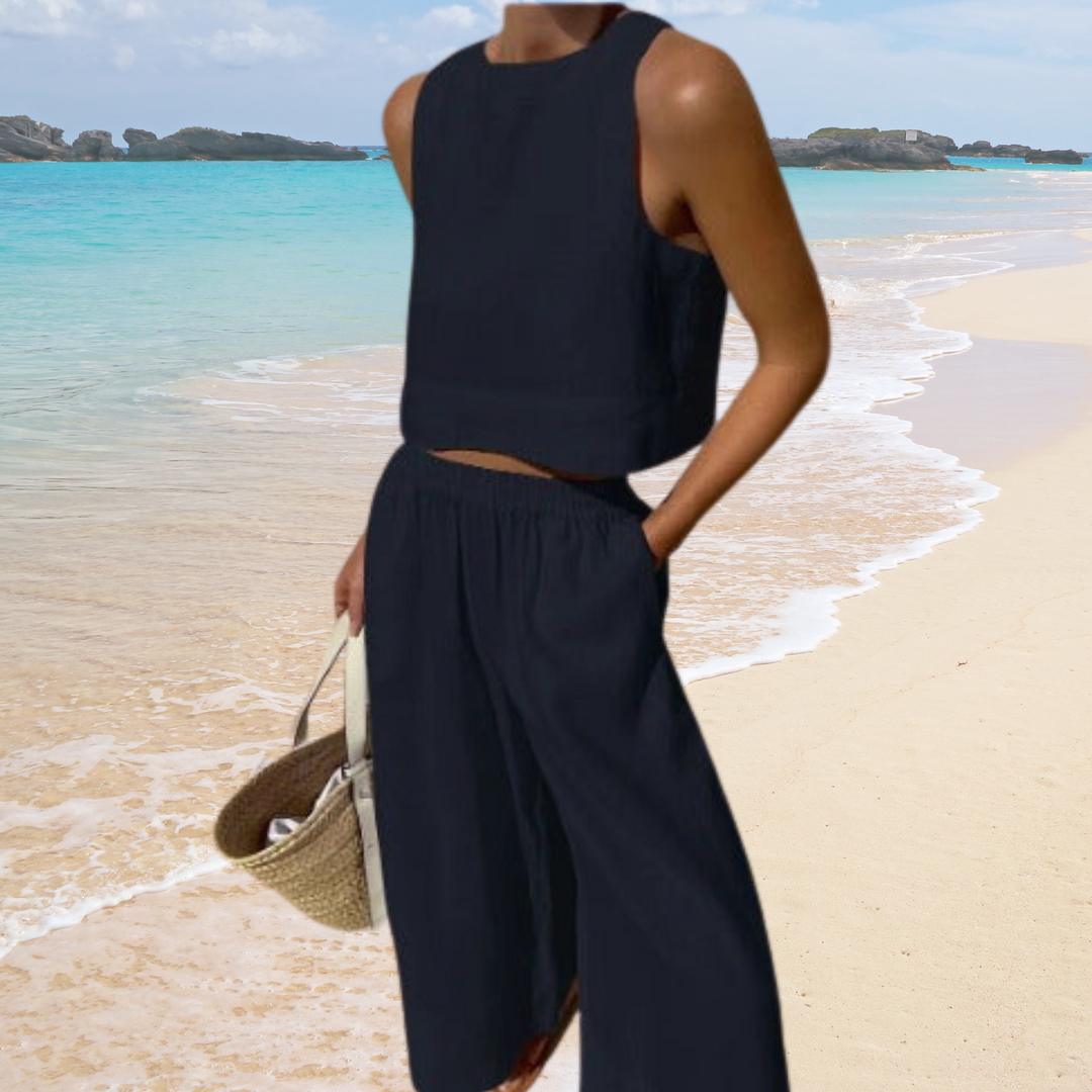 Breathable cotton linen two-piece summer set for women, featuring a crop top & wide-leg pants. Loungewear comfort.