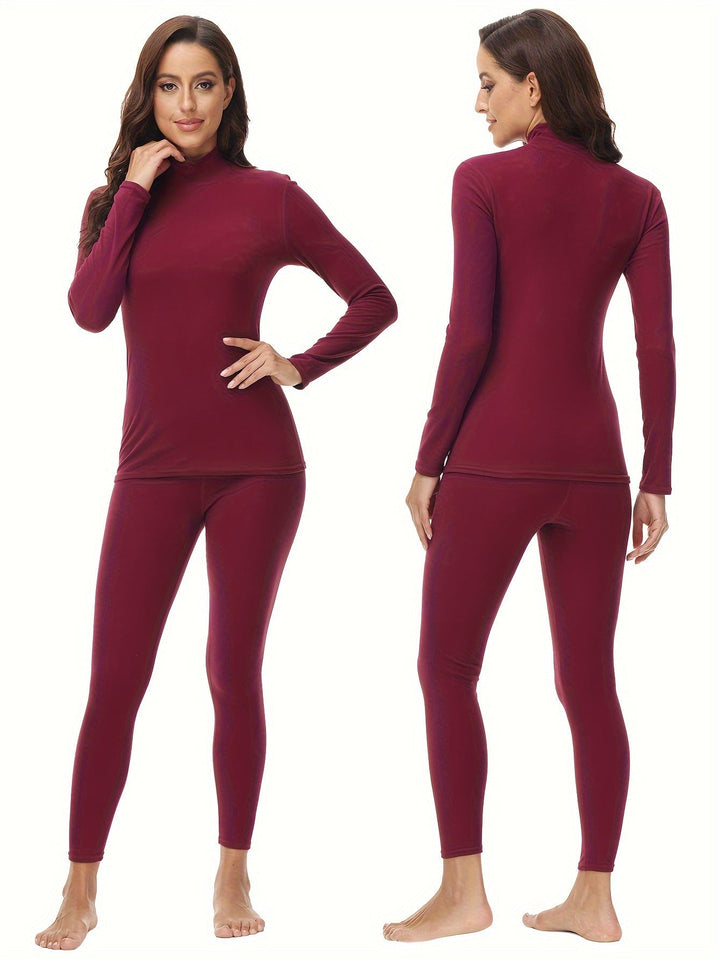 Soft, warm women's two-piece thermal set. Long sleeve top & leggings for cozy winter comfort.