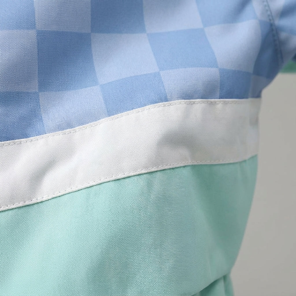 Close-up of women's Mallory two-piece thermal ski suit showing fabric texture & details