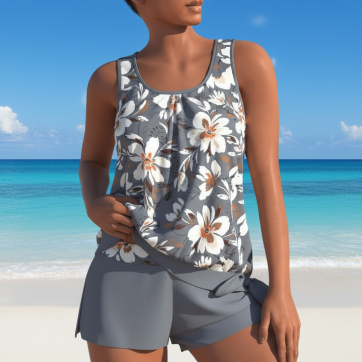 Flattering two-tone tankini for women with vibrant floral pattern, comfortable ladies beachwear.