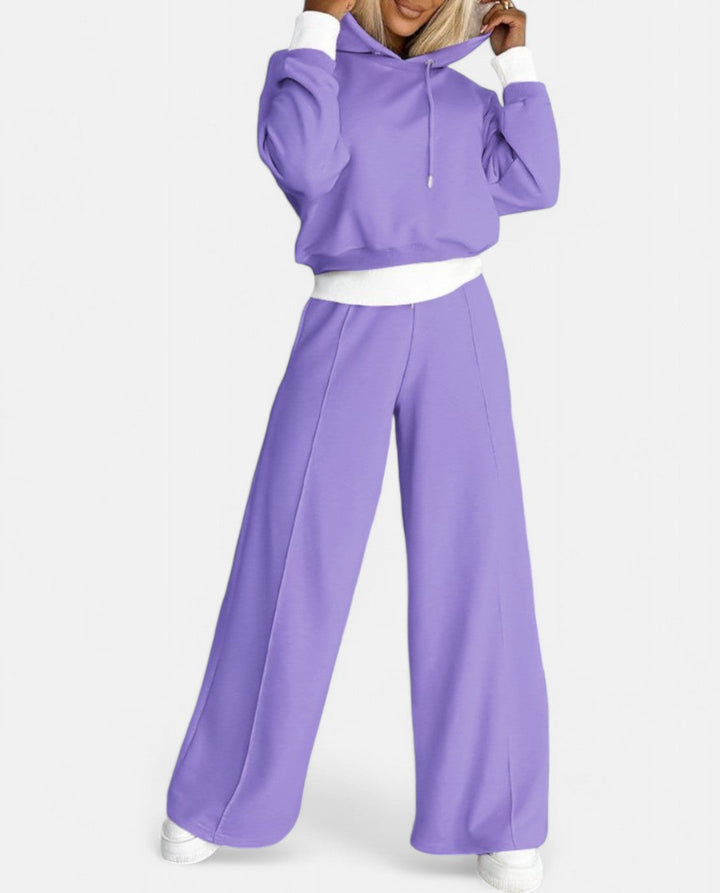Women's two-tone hoodie & wide leg pants set. Stylish, comfortable, and modern two-piece loungewear.