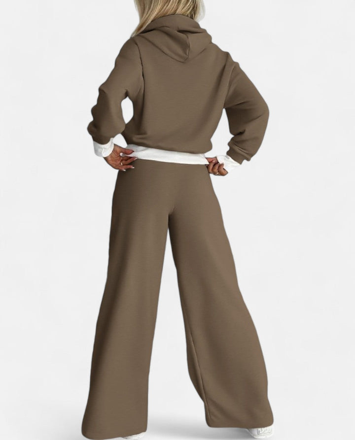 Women's two-tone hoodie and wide leg pant set, designed for stylish comfort. A modern loungewear ensemble.