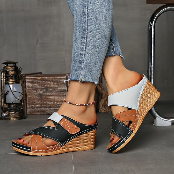 Lightweight two-tone wedge slides for women, comfortable and stylish summer slip-on sandals.
