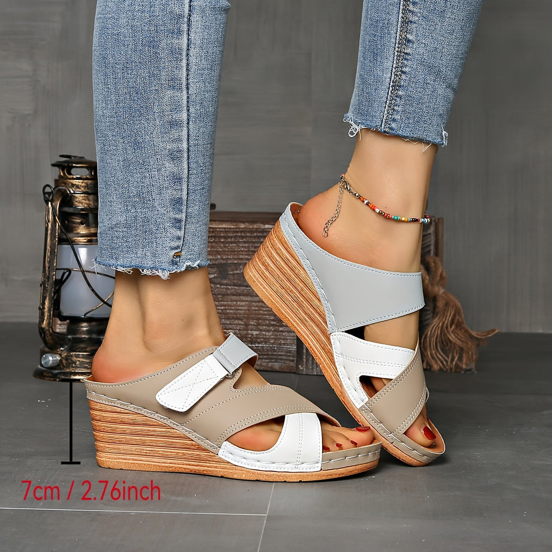 Versatile women's two-tone wedge slides, great for casual elegance and summer comfort.