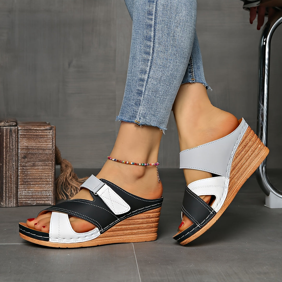 Chic color block wedge slides for women, versatile two-tone summer fashion sandals.