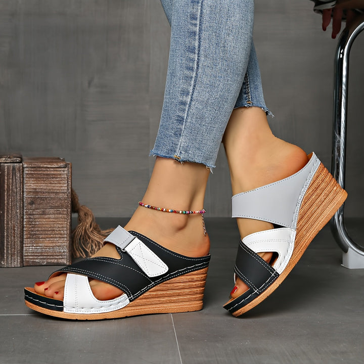 Chic color block wedge slides for women, versatile two-tone summer fashion sandals.