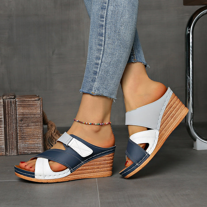 Women's comfortable two-tone wedge slides, ideal for warm weather & everyday summer wear.