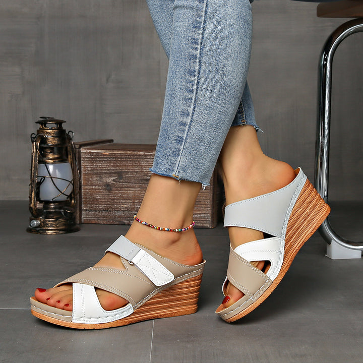 Women's two-tone wedge slides, perfect complement for summer dresses & casual outfits.