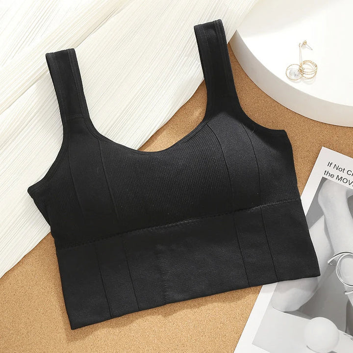 Women's seamless sports bra with ultimate support. Ribbed design for comfortable activewear.