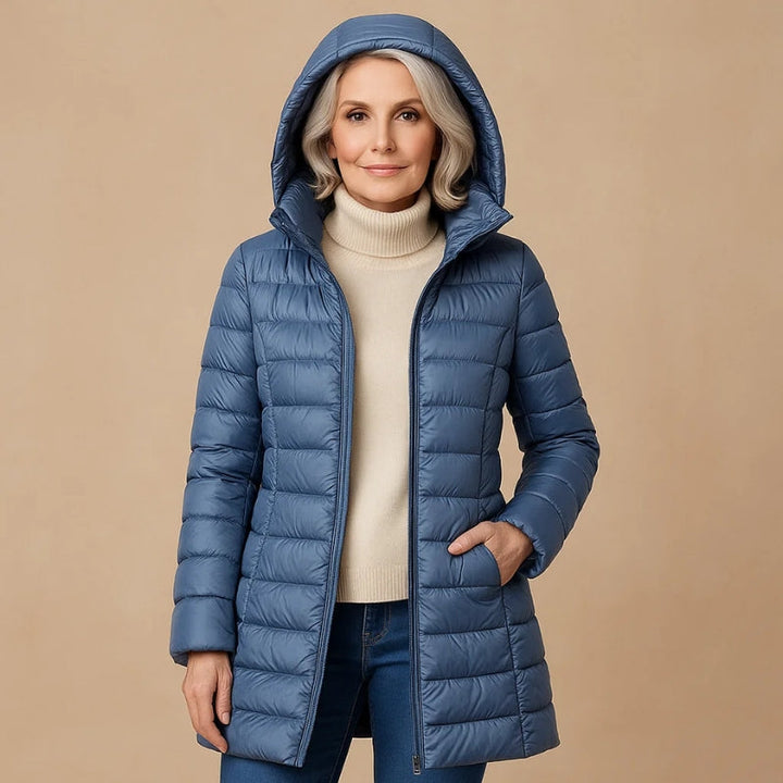 Women's ultra-light insulated puffer jacket for winter, perfect for travel & everyday warmth.