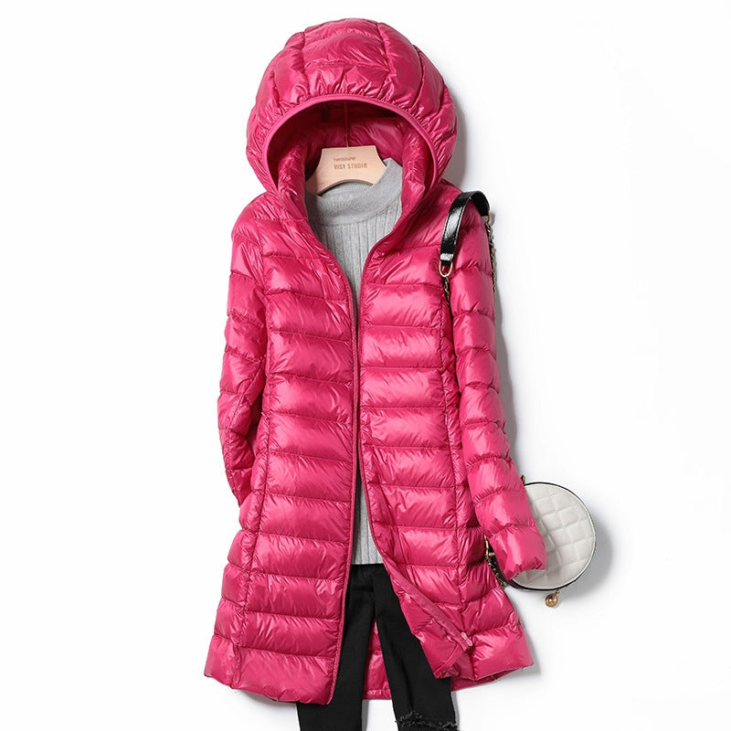 Travel-friendly women's ultra-light puffer, warm insulated jacket, essential winter outerwear.