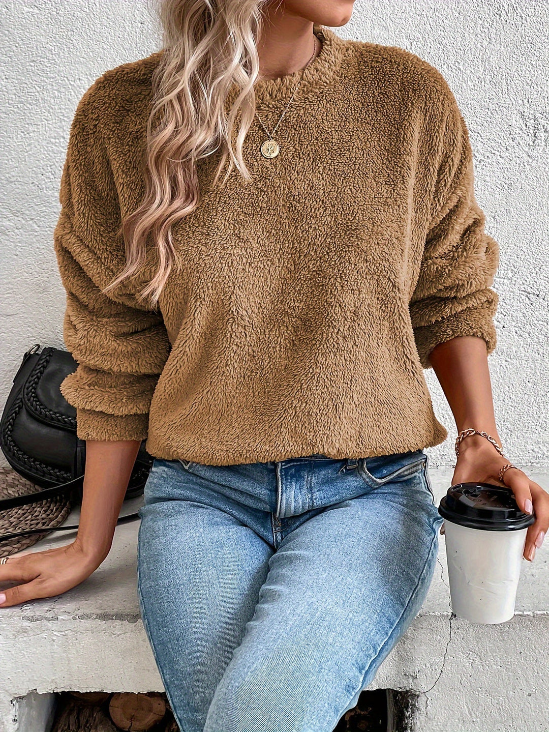 Cozy women's fuzzy teddy pullover sweatshirt, long sleeve for fall & winter fashion, perfect for soft, warm comfort.