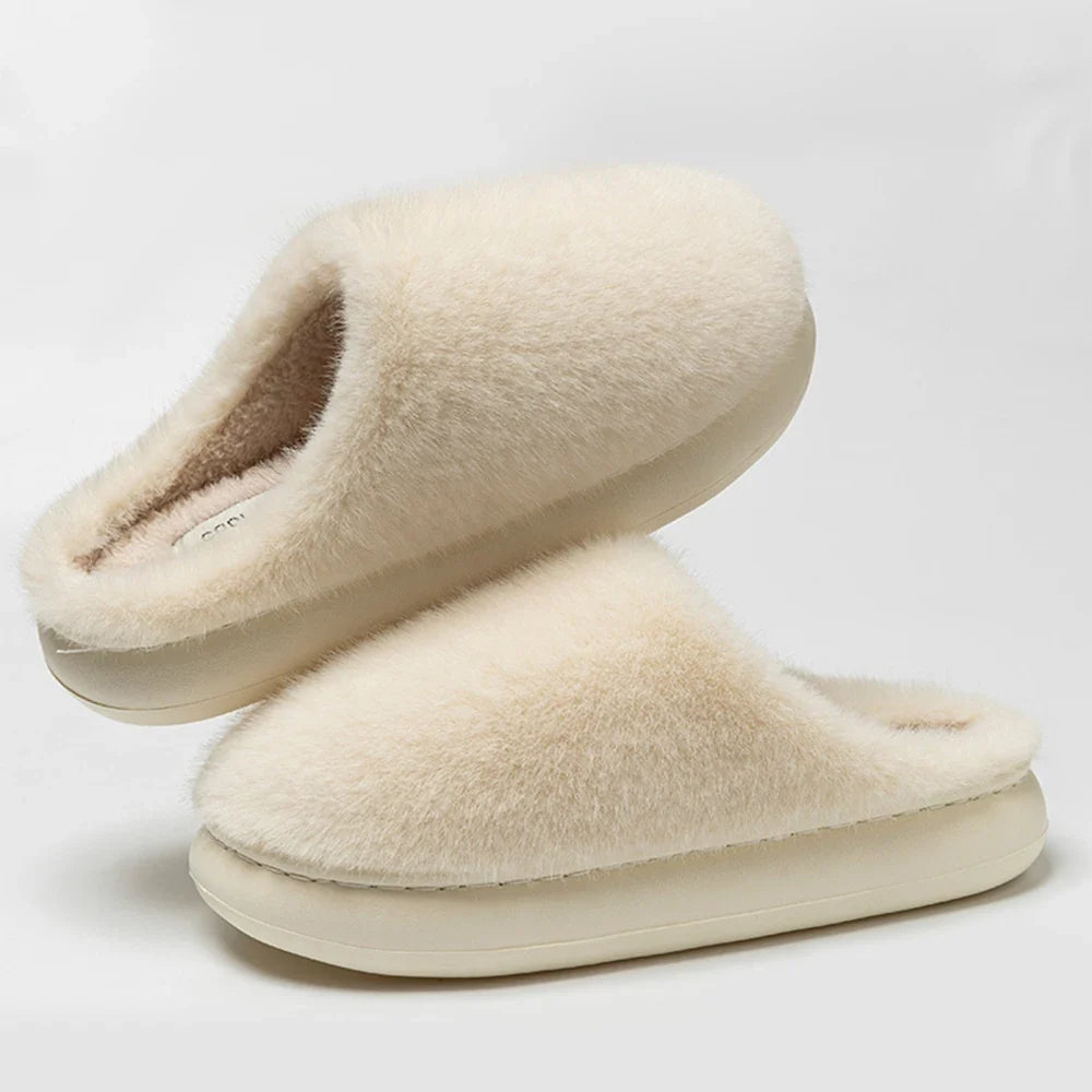 Luxurious women's plush slippers with ultra-soft lining and cushioned sole for ultimate comfort.
