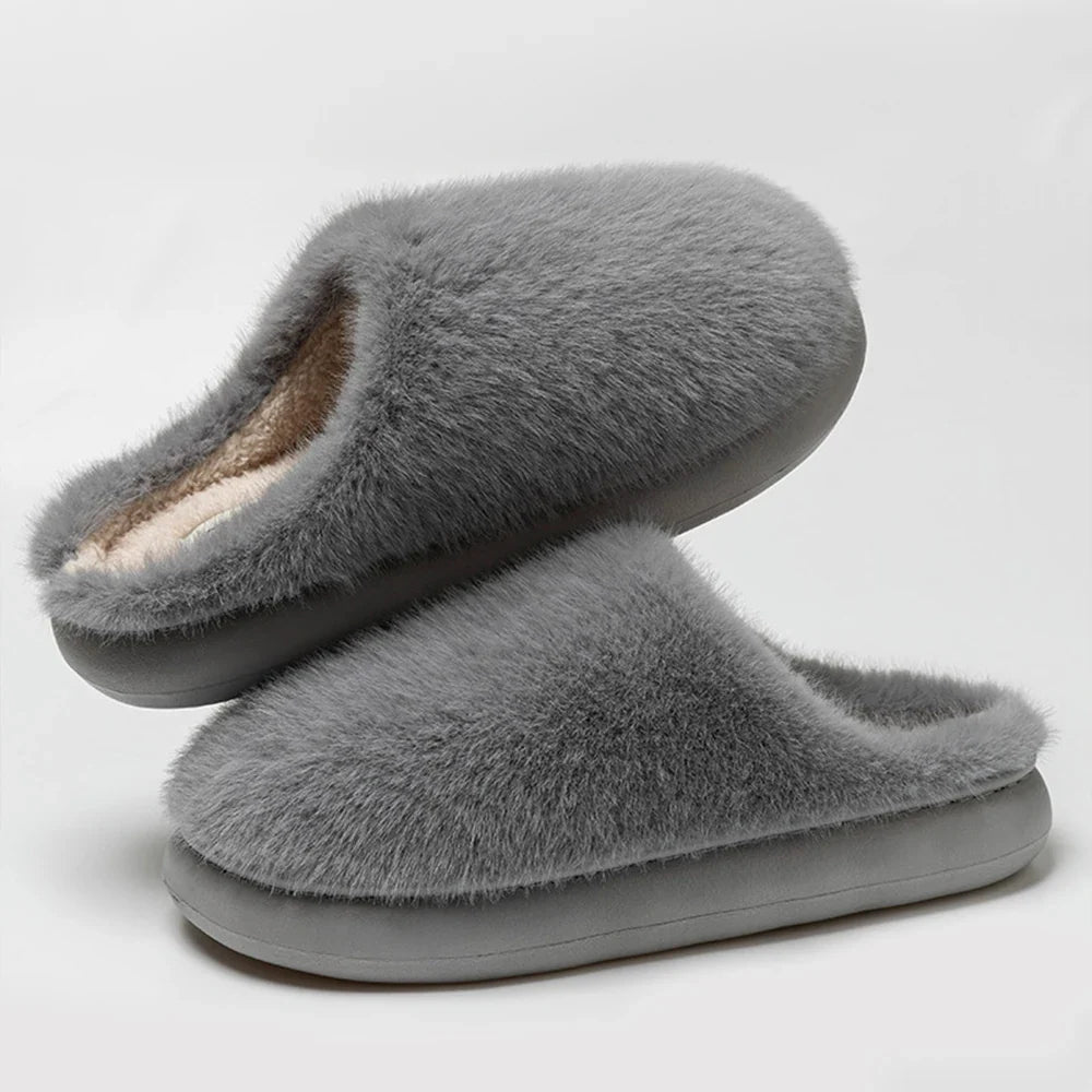 Soft plush house slippers for women, ultra-comfortable and warm indoor footwear.