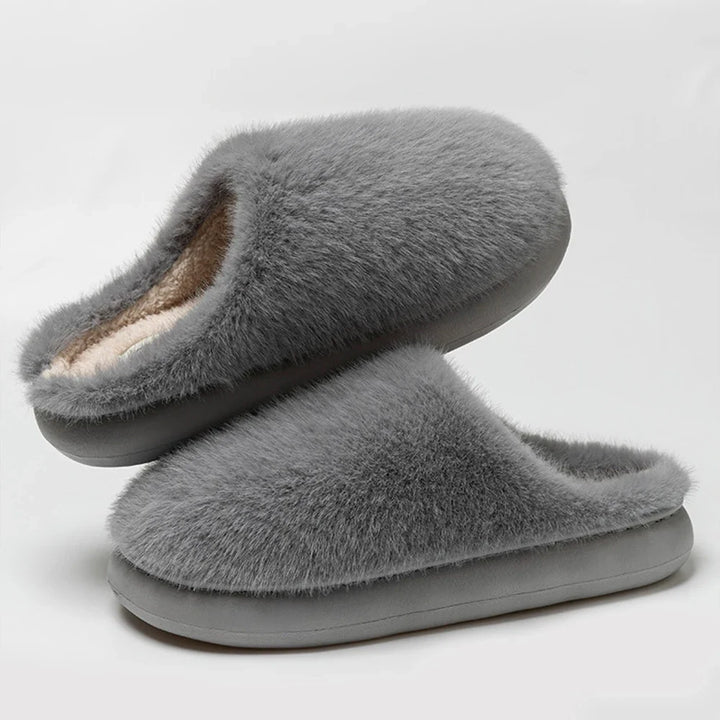 Soft plush house slippers for women, ultra-comfortable and warm indoor footwear.