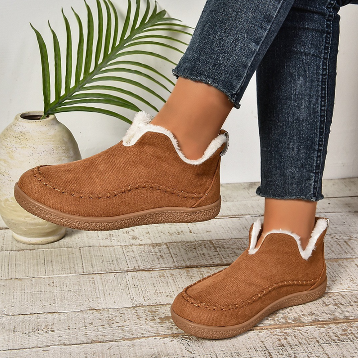 Women's ultra-soft, warm house slippers. Cozy indoor footwear for comfort and relaxation.