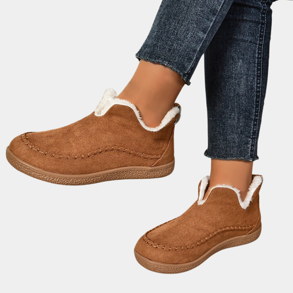 Women's warm winter house slippers. Cozy, comfortable indoor footwear with a soft lining for ultimate comfort.