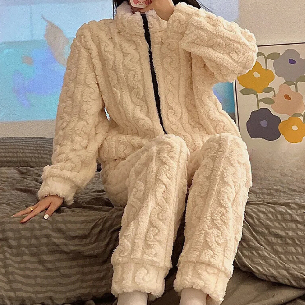 Women's ultra soft & warm Liora onesie jumpsuit for cozy relaxation. Perfect winter loungewear.