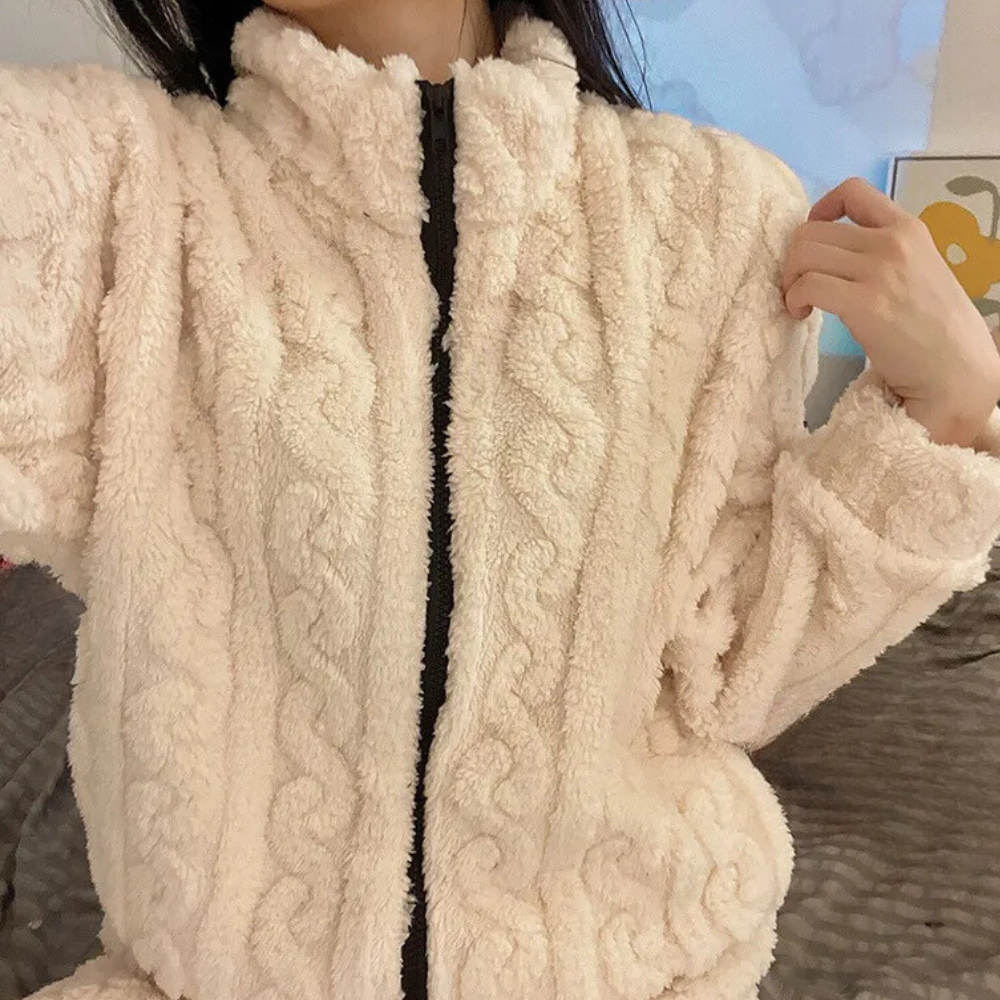 Plush polyester women's onesie, ultra soft and warm. Great for loungewear, sleepwear, or casual winter fashion.
