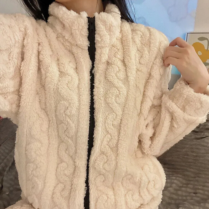 Plush polyester women's onesie, ultra soft and warm. Great for loungewear, sleepwear, or casual winter fashion.