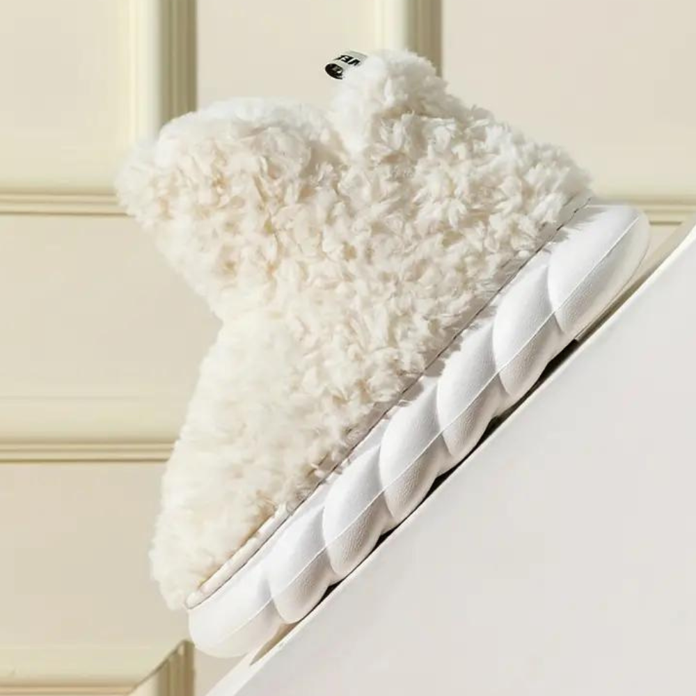 Plush, ultra soft & warm women's teddy slippers. Comfortable indoor house shoes for cozy home relaxation.