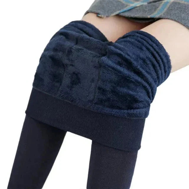 Soft women's thermal pants with fleece lining, ideal for cold weather. High waist for support & warm, versatile style.