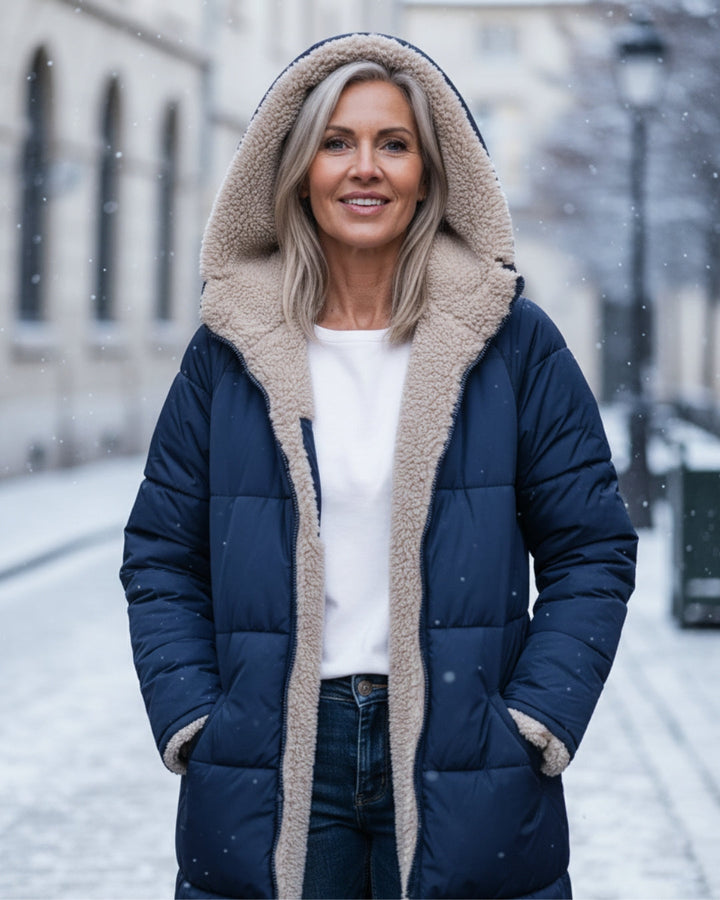 Stylish women's quilted winter coat. Long, ultra-warm design for cozy cold weather.