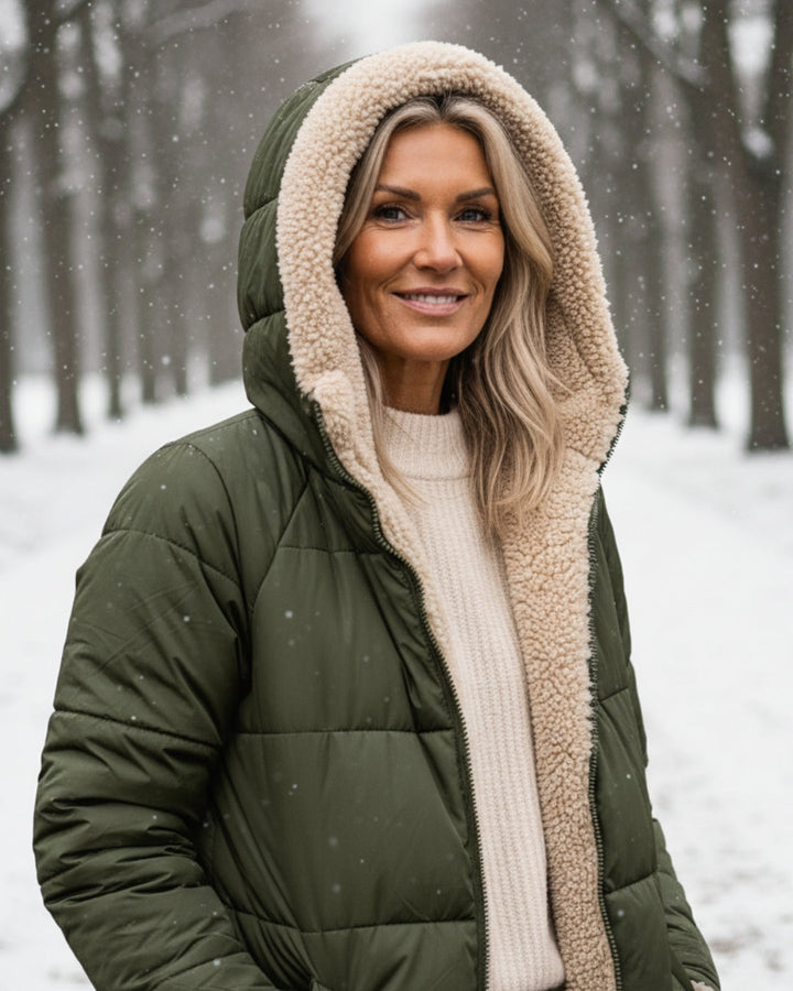 Women's elegant ultra-warm quilted winter coat. Long outerwear for cozy cold weather style.