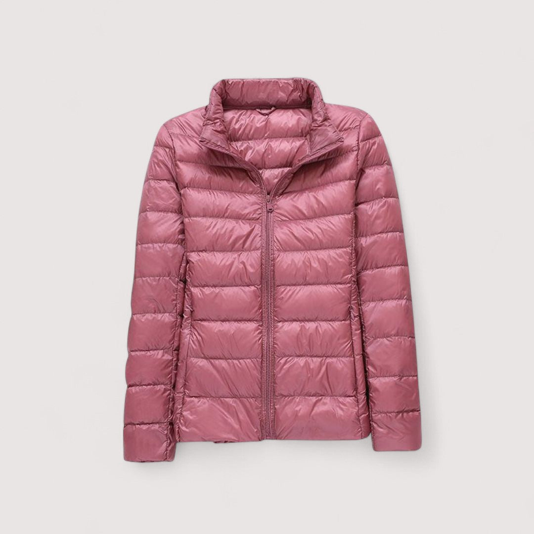 Weather-resistant women's ultralight winter jacket, offering warmth and style.