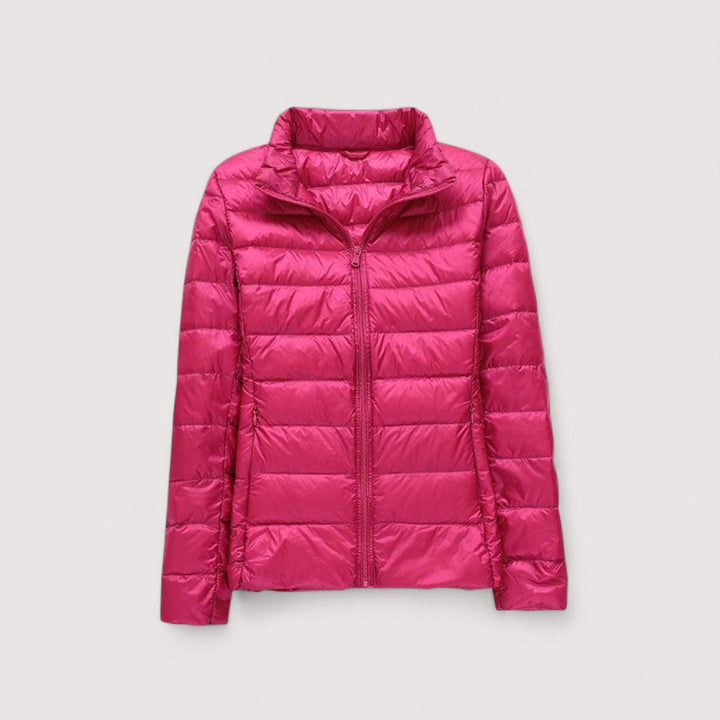 Lightweight women's outerwear, an ultralight winter jacket for travel and style.