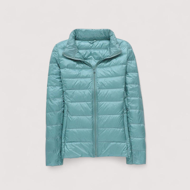 Cozy women's winter jacket, ultralight design. Warm, stylish, and weather resistant.