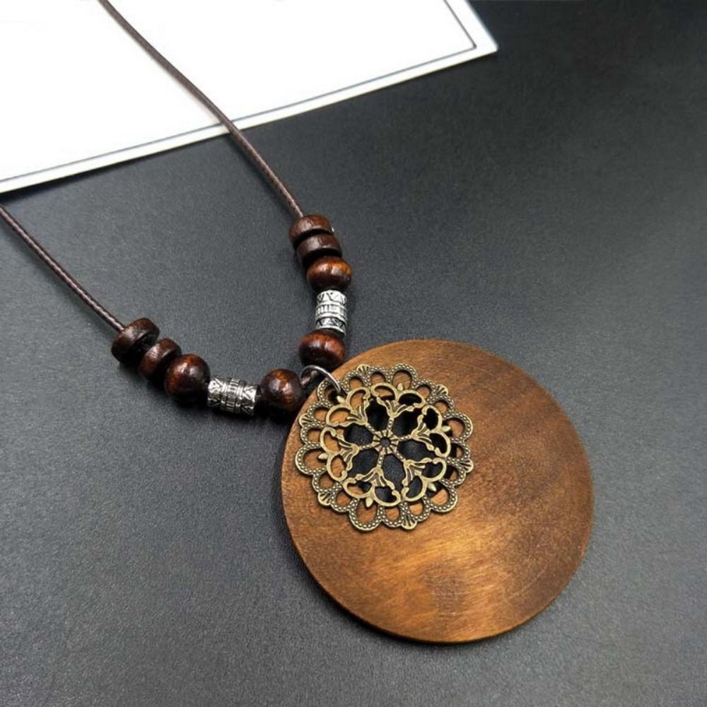 Fashionable women's boho wooden pendant necklace with a unique retro round design.