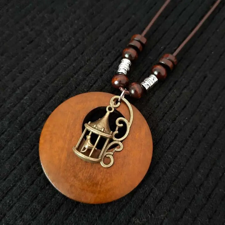 Retro round wooden pendant necklace, unique boho style jewelry for women.