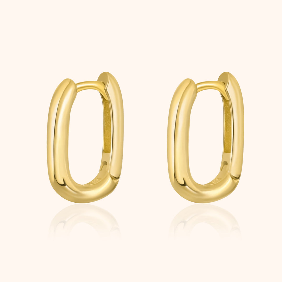 Women's unique gold & silver hoop earrings. Minimalist design, perfect fashion accessory for everyday wear.