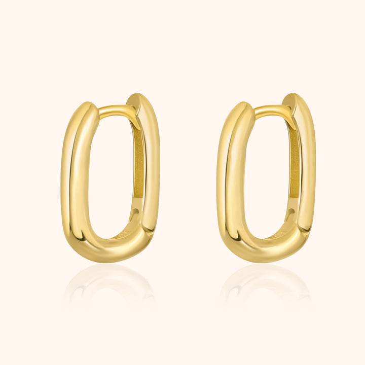 Women's unique gold & silver hoop earrings. Minimalist design, perfect fashion accessory for everyday wear.