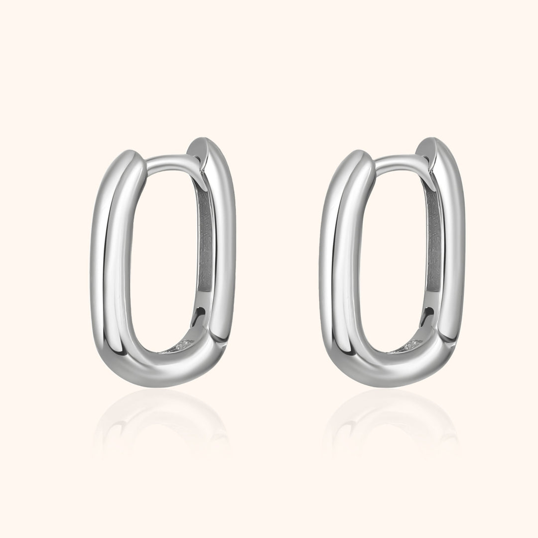 Isa unique chain hoop earrings in gold & silver. Modern minimalist women's jewelry, perfect for any occasion.