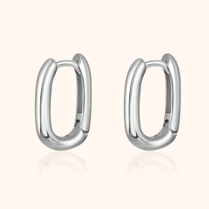 Isa unique chain hoop earrings in gold & silver. Modern minimalist women's jewelry, perfect for any occasion.